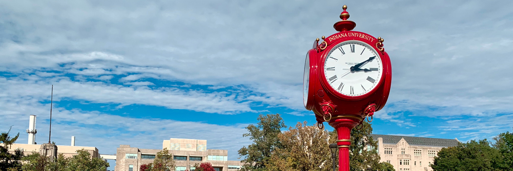 A banner of a red IU clock tower